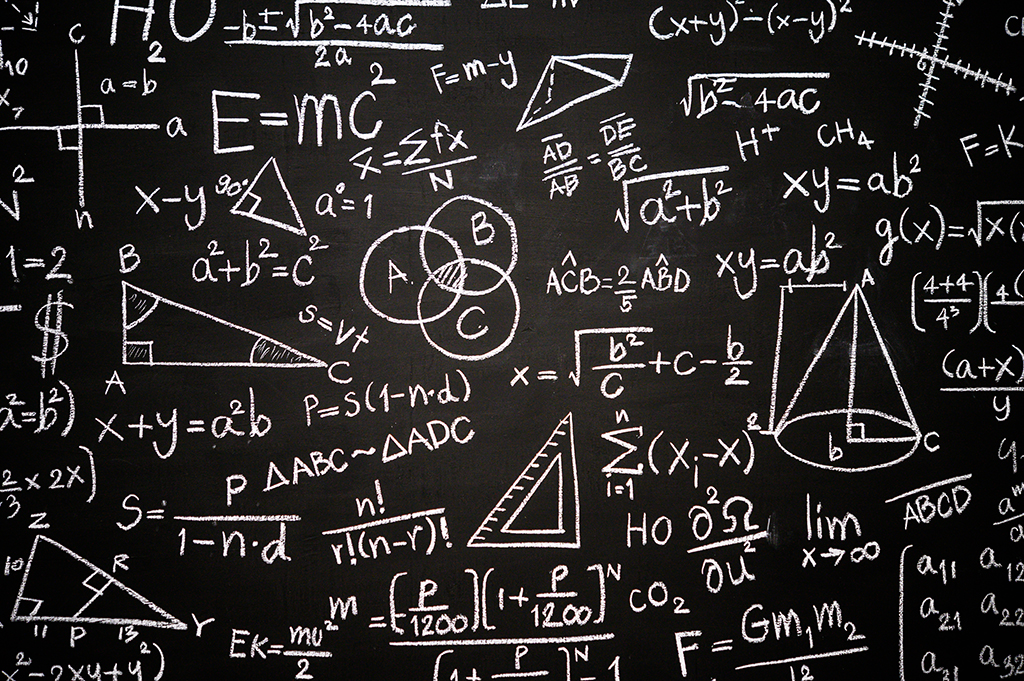 Blackboard inscribed with scientific formulas and calculations i Machingo