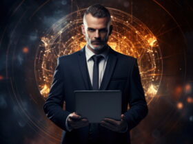 Businessman in a dark suit holding a tablet, with a glowing orange digital network behind him.