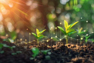 Young green sprouts rising from soil with a glowing, abstract data graph of dots and lines overlaying the scene.