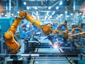 Industrial robot arms welding on a production line in a high-tech factory with holographic overlays
