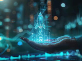Holographic rocket projection hovering above an open hand in a blue-lit high-tech setting.
